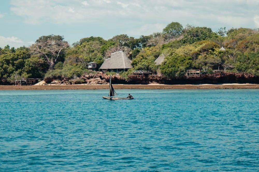Dhow on turquoise water on the Kenyan coast
